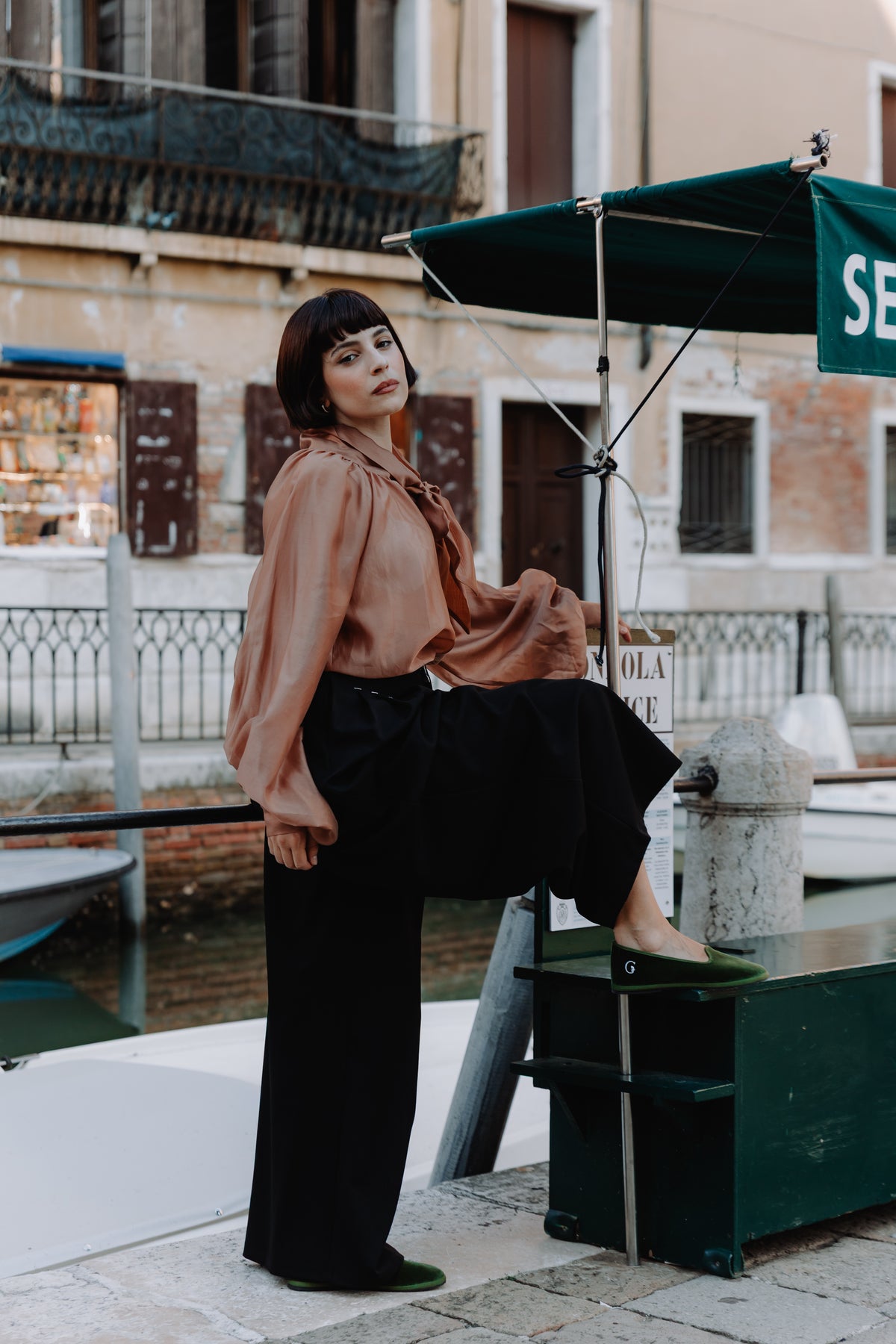 Handcrafted Gondolina Sant Erasmo flats in light green velvet, featuring authentic Venetian design, lifestyle