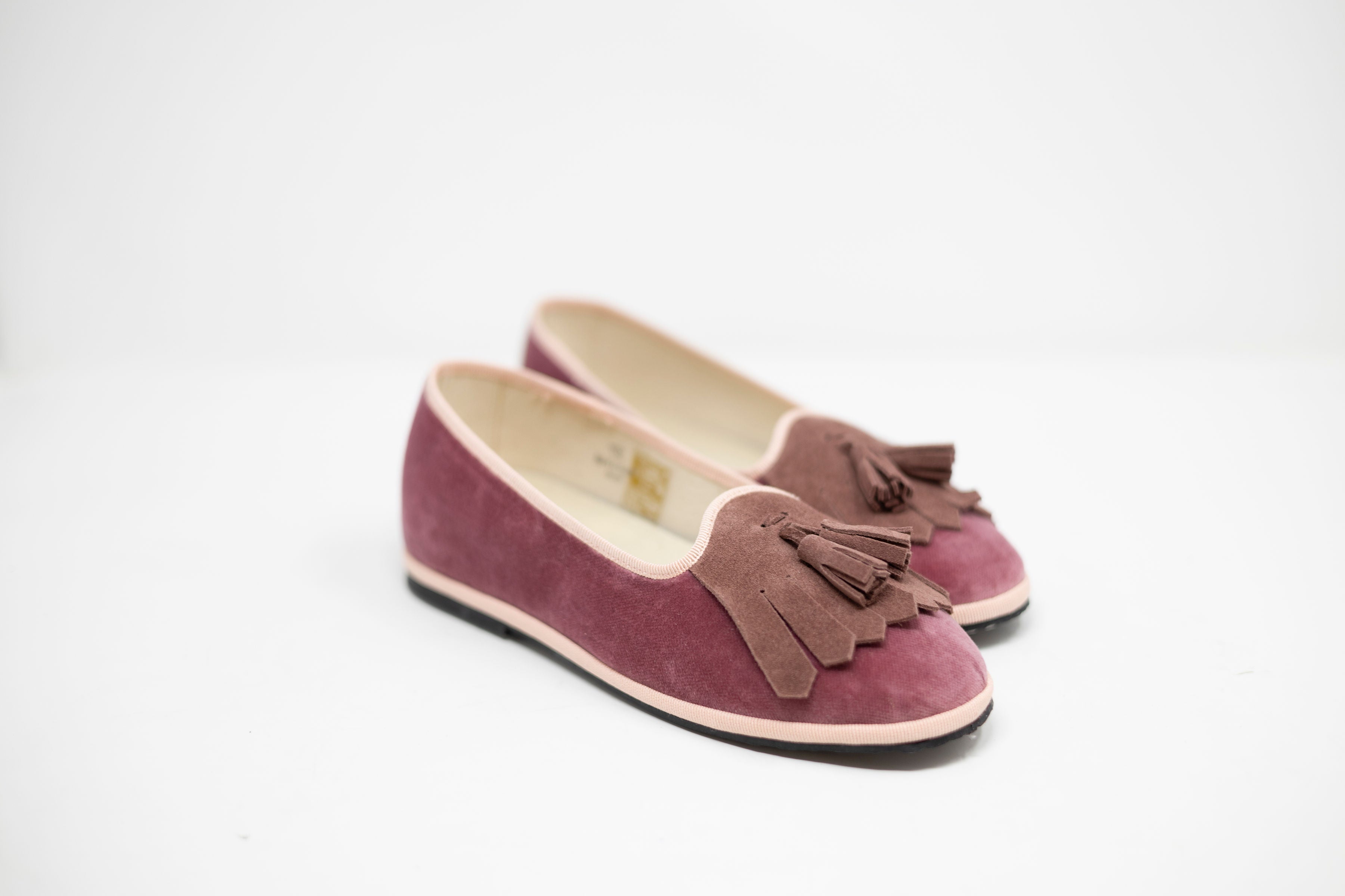 Handcrafted Gondolina Faloria fringe tassel flats in pink velvet, featuring authentic Venetian design, close-up