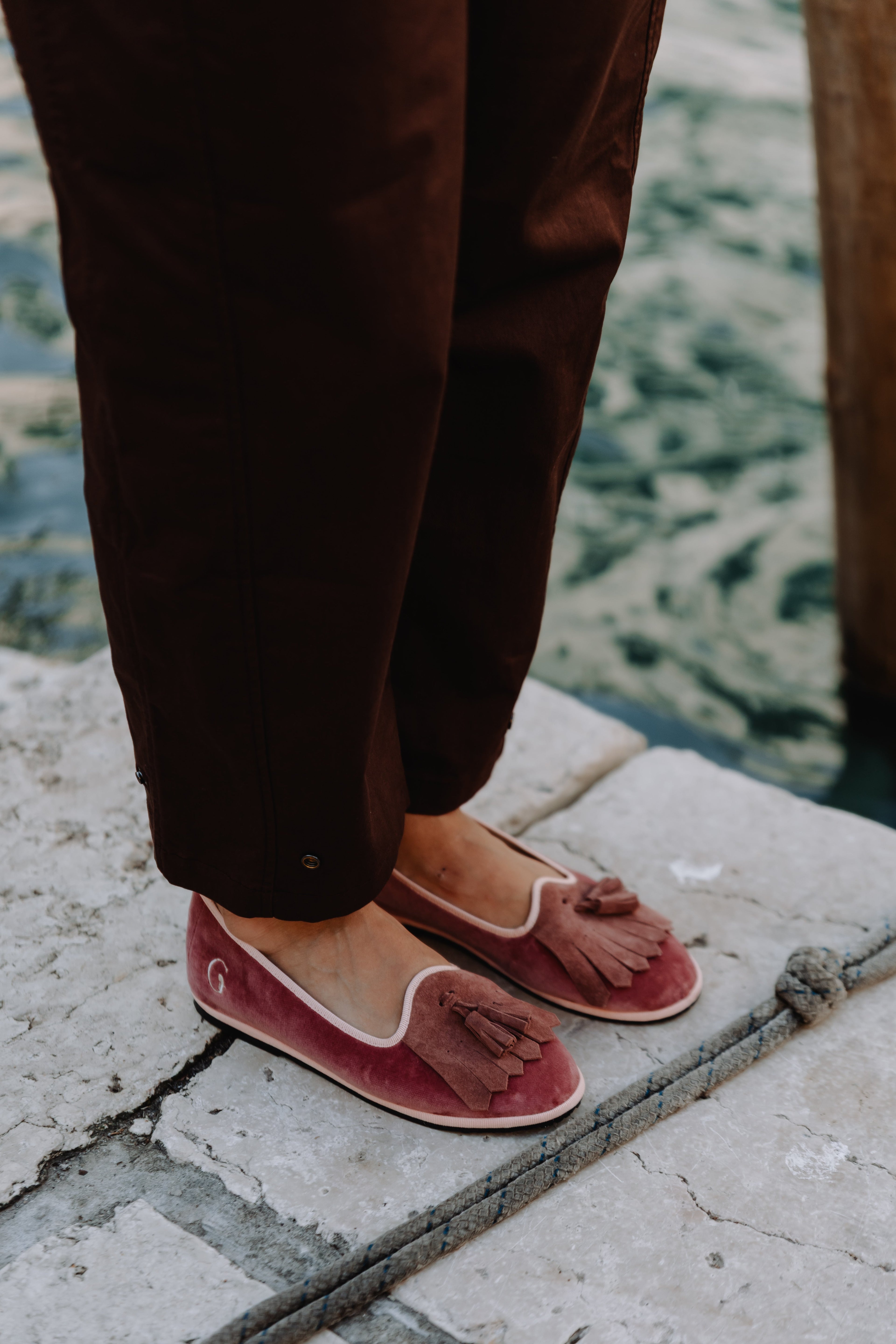 Handcrafted Gondolina Faloria fringe tassel flats in pink velvet, featuring authentic Venetian design, lifestyle