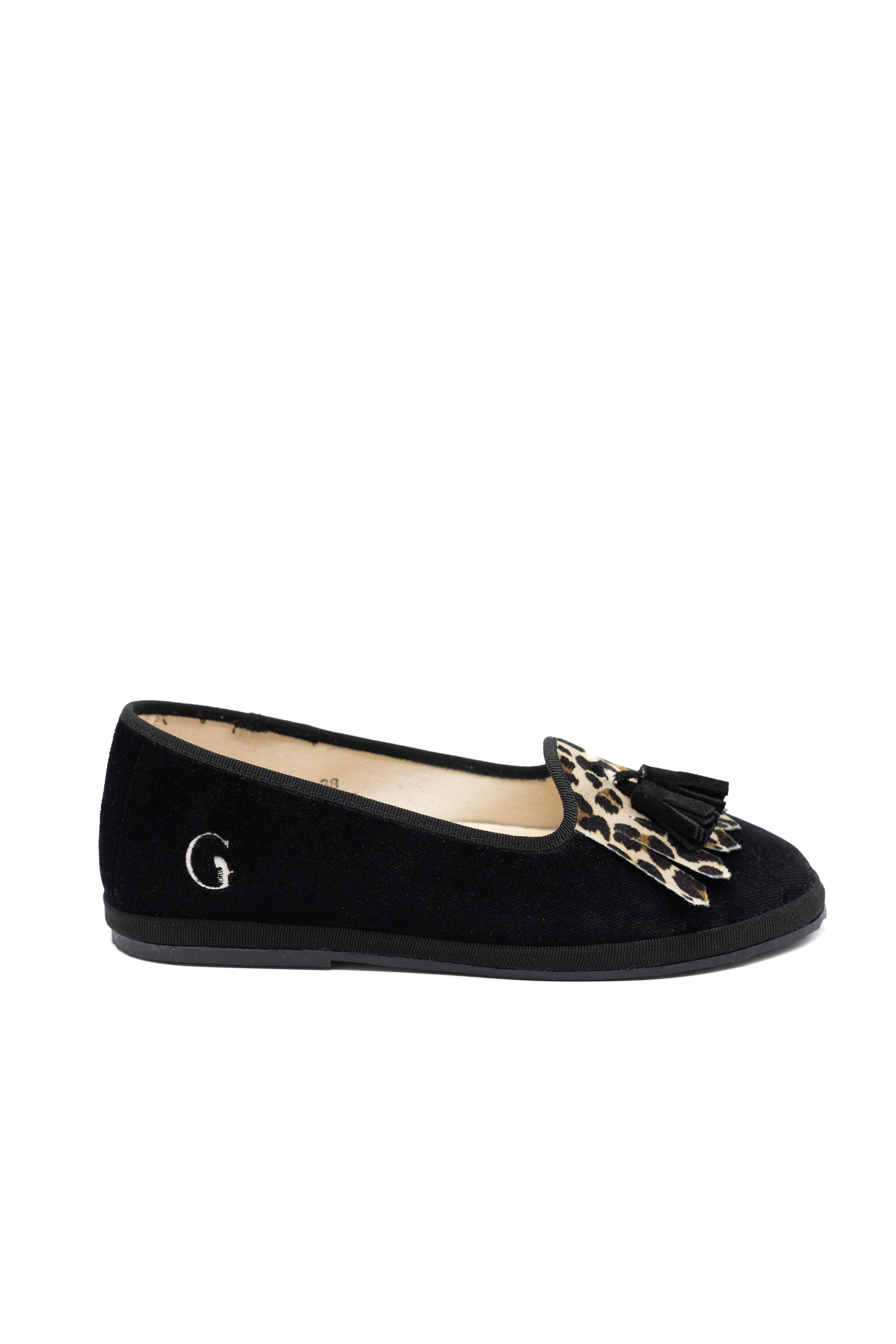 Handcrafted Gondolina Olympia tassel flats in black and leopard fringe in velvet for women, featuring authentic Venetian design, side view