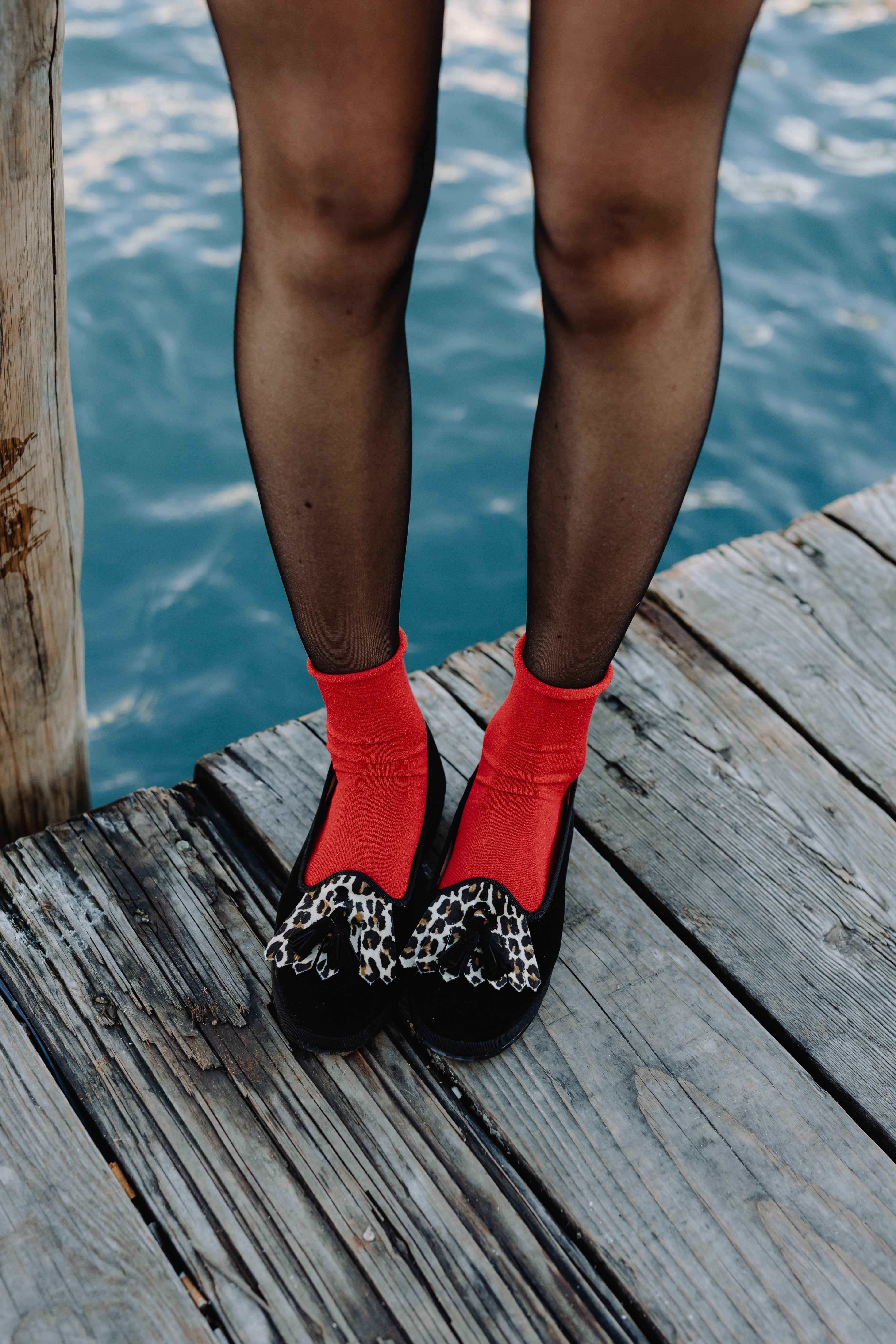 Handcrafted Gondolina Olympia tassel flats in black and leopard fringe in velvet for women, featuring authentic Venetian design, lifestyle