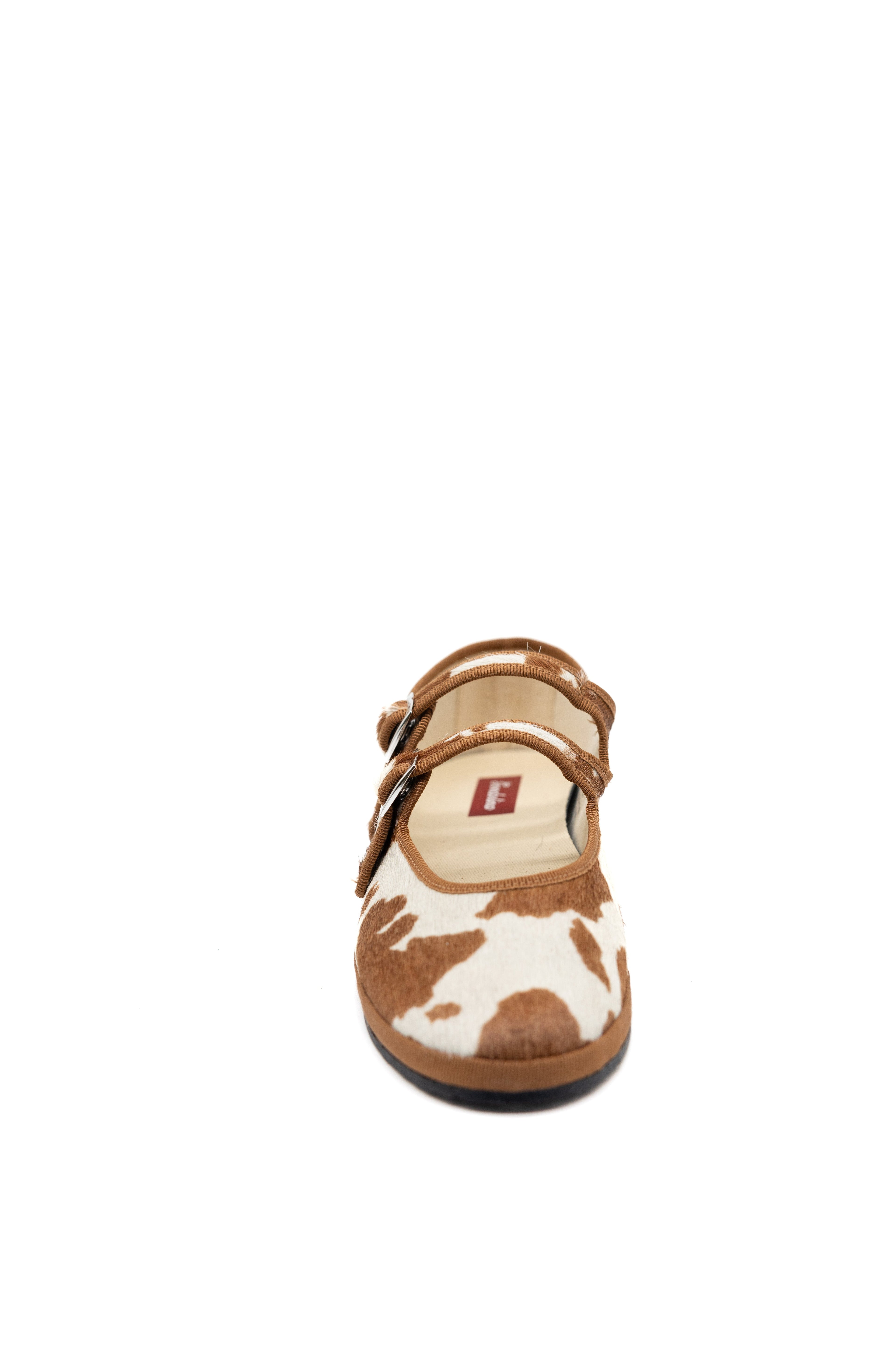Handcrafted Gondolina Rodeo Mary Jane in cow print, featuring authentic Venetian design, front view
