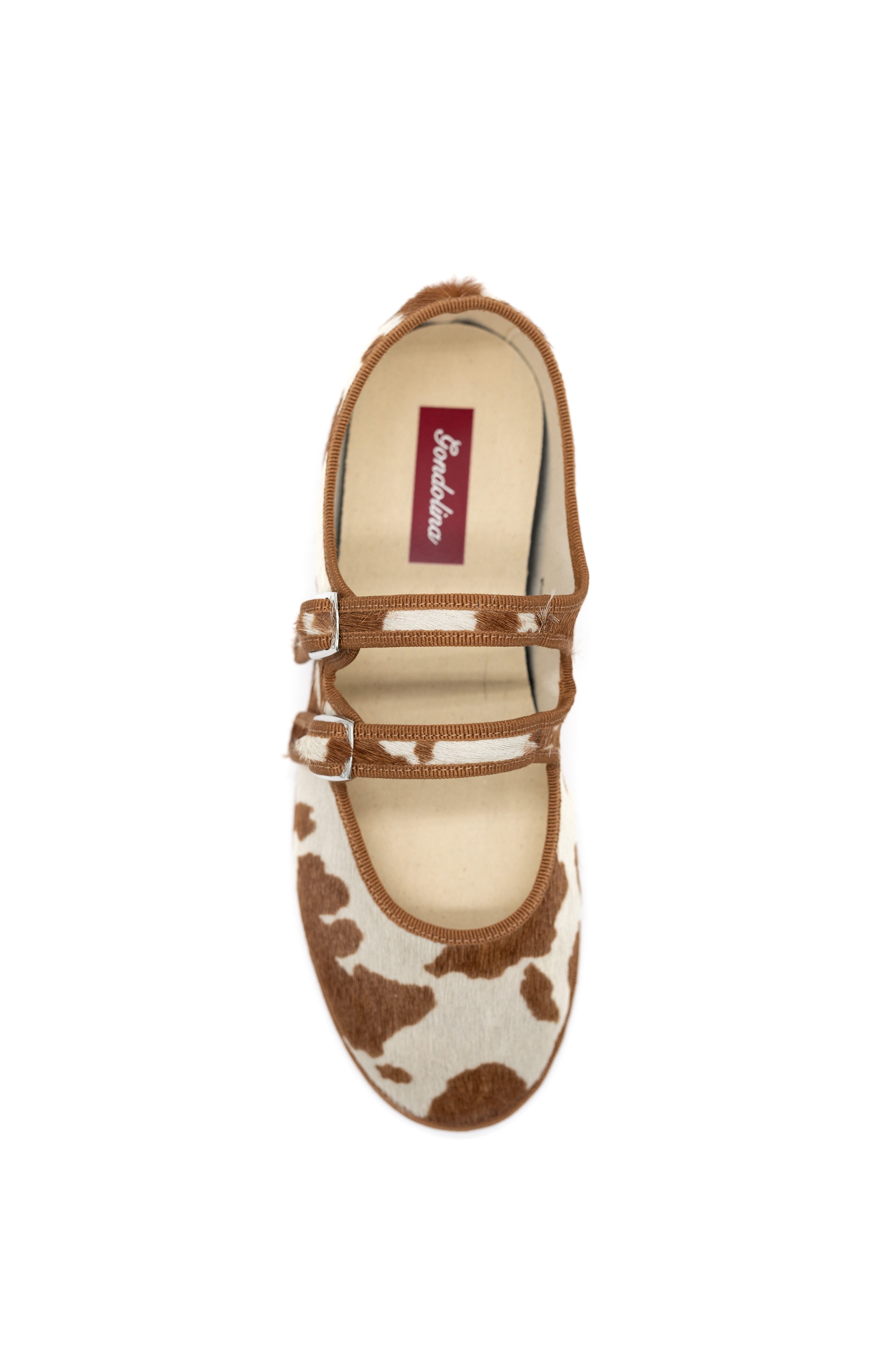 Handcrafted Gondolina Rodeo Mary Jane in cow print, featuring authentic Venetian design, top view